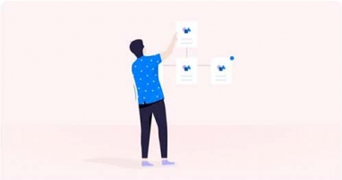 Man pinning notes on a wall